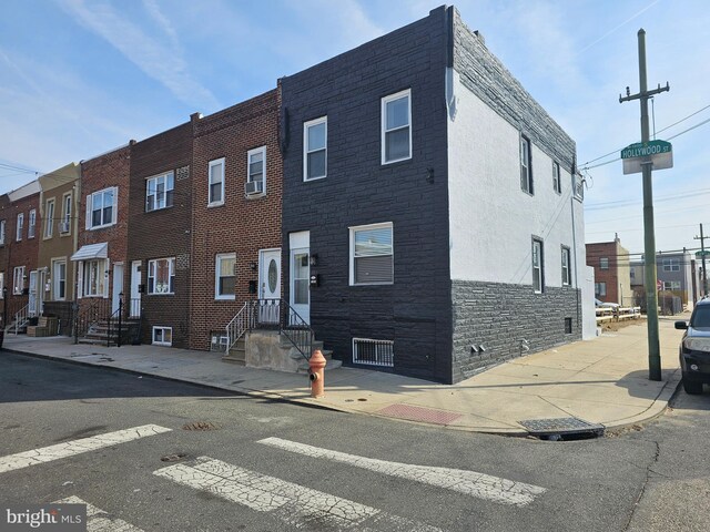 multi unit property with stone siding