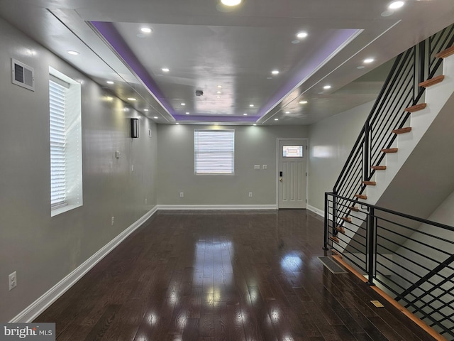 entrance foyer featuring recessed lighting, visible vents, baseboards, and wood finished floors