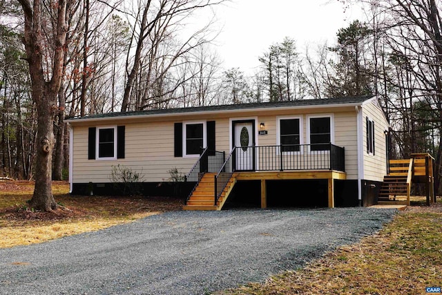 view of front of property featuring stairs