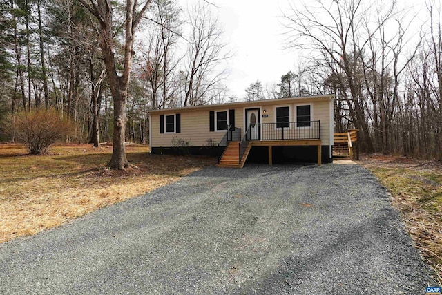 view of front of house featuring a wooden deck