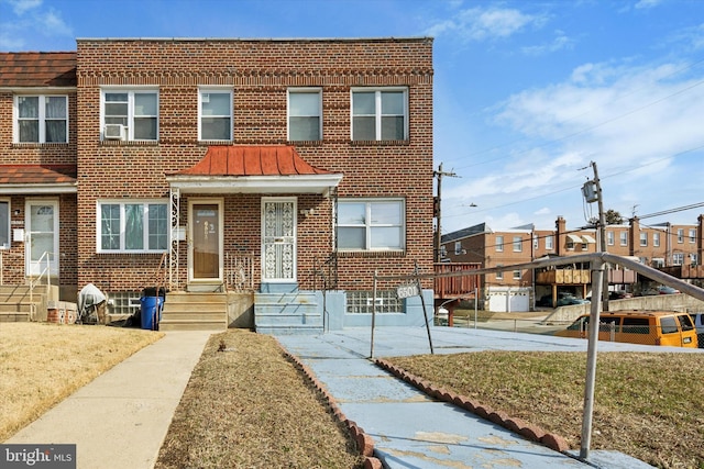 multi unit property featuring brick siding