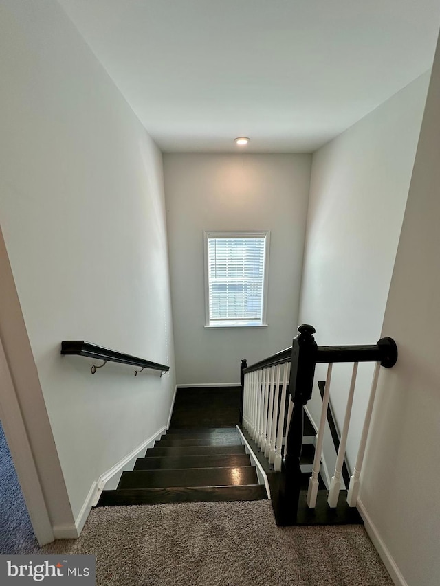 stairway with baseboards