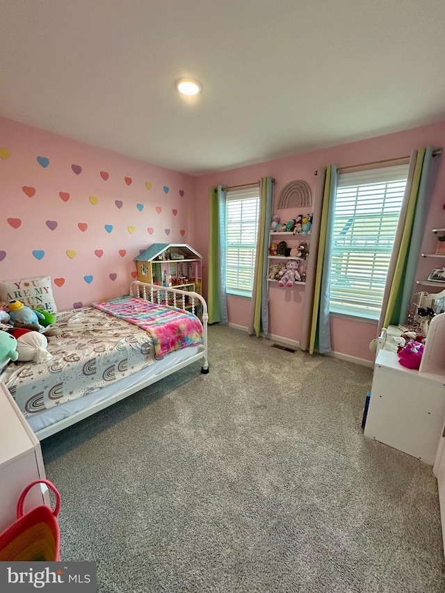 bedroom featuring baseboards, carpet flooring, and wallpapered walls