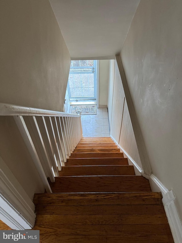 stairs with expansive windows