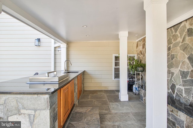 view of patio / terrace with a sink