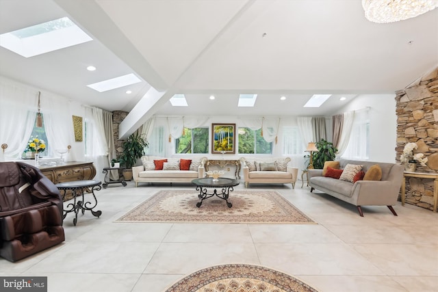 tiled living area featuring lofted ceiling with skylight and recessed lighting