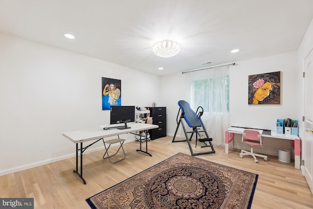 office area with recessed lighting, light wood-type flooring, and baseboards