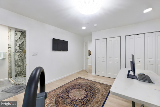 office area with recessed lighting, light wood-style floors, and baseboards