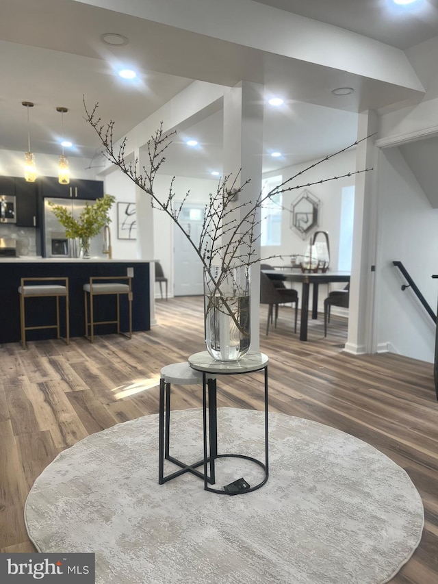 living room featuring recessed lighting and wood finished floors