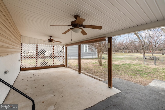 view of patio / terrace featuring a gate, ceiling fan, and fence