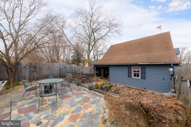 view of patio / terrace with outdoor dining space and a fenced backyard