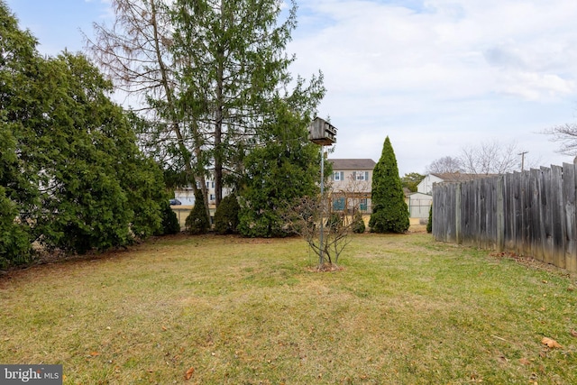 view of yard with fence