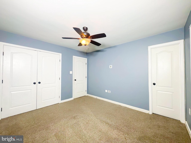 2204 Holly Oak Ct, Waldorf, MD 20601 - unfurnished bedroom featuring a closet, baseboards, a ceiling fan, and carpet