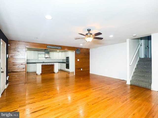 2204 Holly Oak Ct, Waldorf, MD 20601 - unfurnished living room featuring recessed lighting, stairs, light wood-style flooring, and ceiling fan