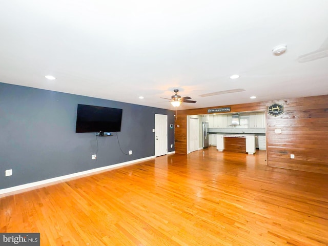 2204 Holly Oak Ct, Waldorf, MD 20601 - unfurnished living room with light wood-type flooring, ceiling fan, baseboards, and recessed lighting