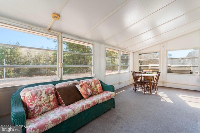 sunroom / solarium with lofted ceiling