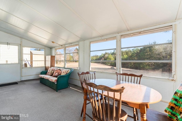 sunroom / solarium with vaulted ceiling