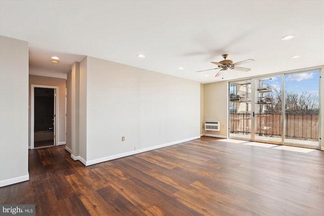 empty room featuring recessed lighting, wood finished floors, baseboards, and ceiling fan