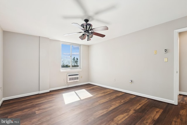 unfurnished room with ceiling fan, wood finished floors, baseboards, and a wall mounted AC