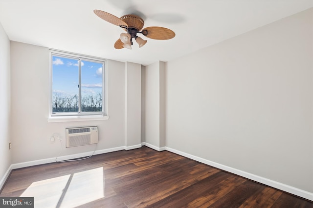 empty room featuring ceiling fan, baseboards, a wall mounted AC, and dark wood-type flooring