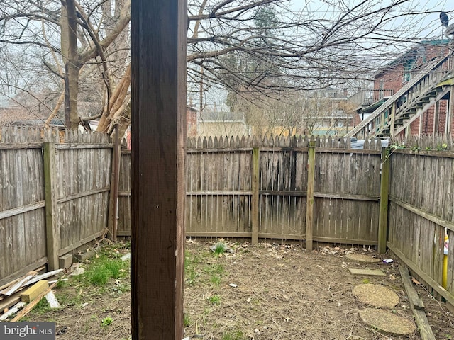 view of yard featuring a fenced backyard