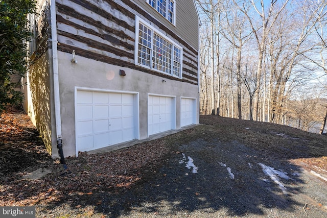 garage with driveway