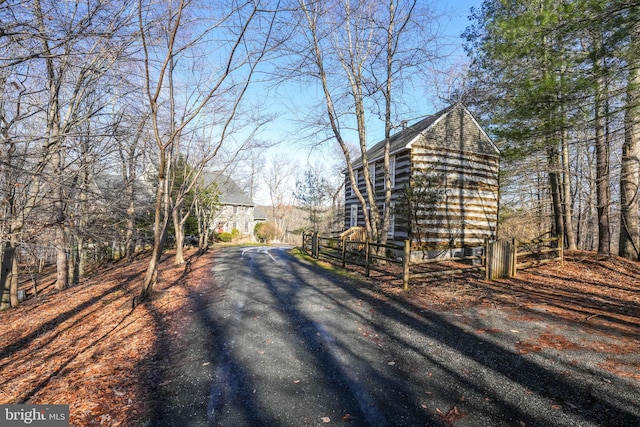 view of side of property with driveway