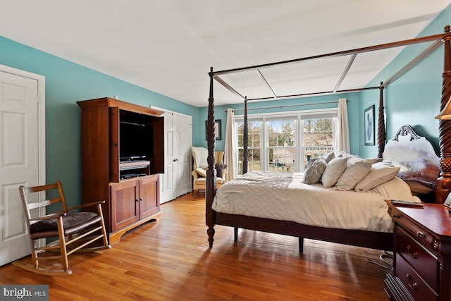 bedroom with light wood-style flooring