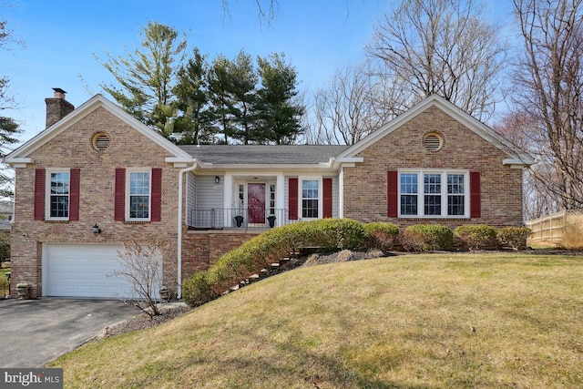 single story home with brick siding, driveway, an attached garage, and a front lawn