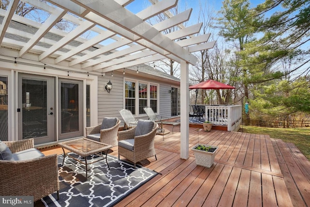 wooden deck featuring a pergola