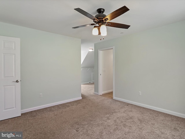 bonus room featuring baseboards, carpet floors, and a ceiling fan