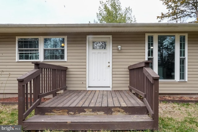 doorway to property with a deck