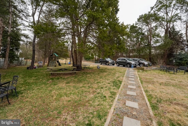 view of yard featuring playground community