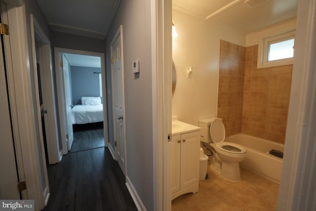 full bath with tile patterned floors, toilet, and vanity