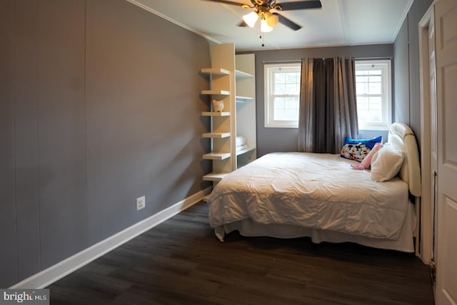 bedroom featuring baseboards, ceiling fan, dark wood-style flooring, and ornamental molding