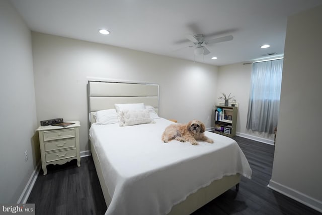 bedroom featuring recessed lighting, dark wood-type flooring, and baseboards