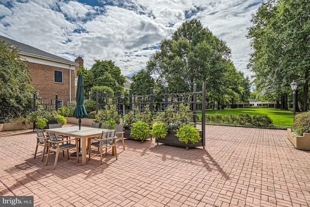 view of patio with outdoor dining space