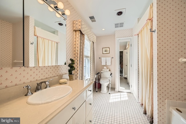 full bath with visible vents, wallpapered walls, toilet, tile patterned floors, and vanity