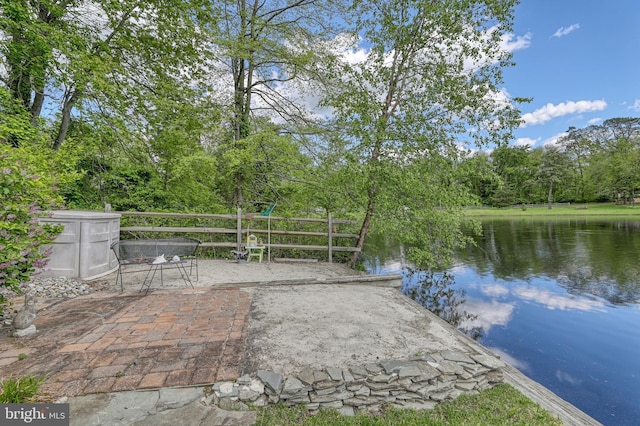 view of patio / terrace featuring a water view