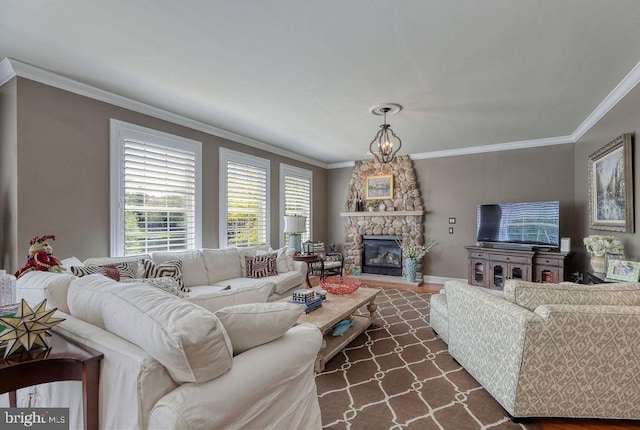 living room featuring dark wood finished floors, ornamental molding, and a fireplace