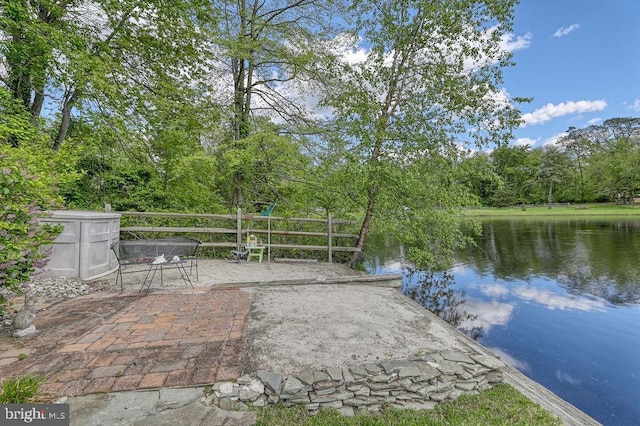 view of patio / terrace featuring a water view