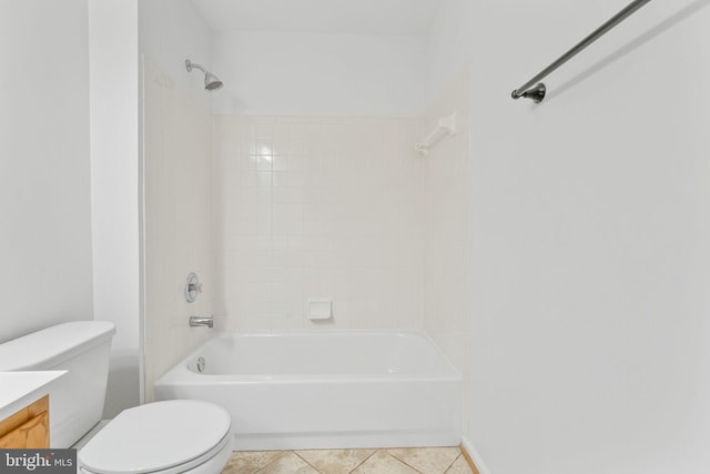 bathroom featuring vanity, shower / bathing tub combination, toilet, and tile patterned floors