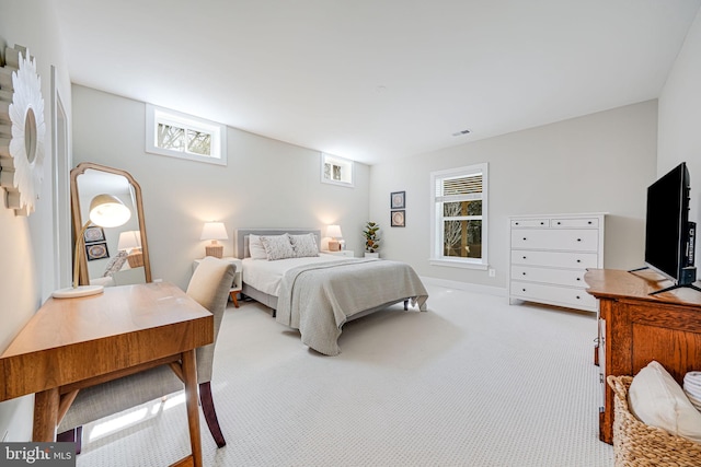 bedroom featuring carpet and visible vents