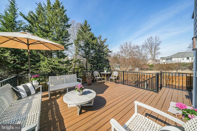 deck featuring an outdoor living space