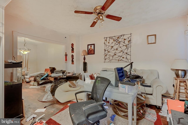 living area featuring wood finished floors and a ceiling fan