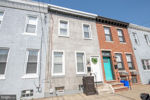 townhome / multi-family property with stucco siding