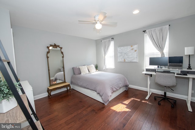 bedroom featuring a ceiling fan, baseboards, and hardwood / wood-style floors