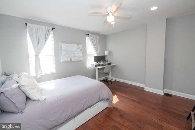 bedroom with recessed lighting, wood finished floors, baseboards, and ceiling fan