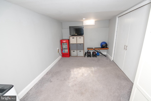 interior space featuring baseboards and carpet floors