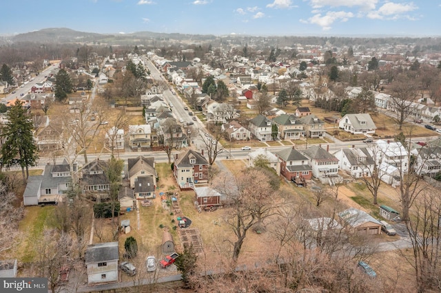 birds eye view of property with a residential view